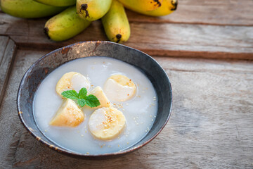 Banana in Coconut Milk. Traditional dessert of asian, Thailand.