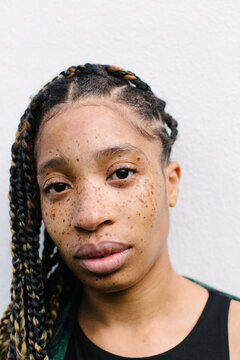 Portrait Of Girl With Freckles And Braids