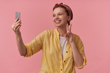 Image of european charming woman 20s with natural makeup wearing trendy summer posing over pink...