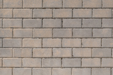 Monotone gray paving stones pavement. Background horizontal texture.