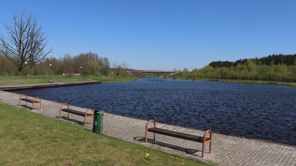 channel quayside with bench and pathway