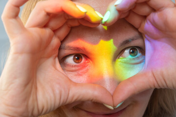 Rainbow color spectrum light on the face