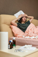 Obraz na płótnie Canvas sick girl having influenza symptoms coughing at home