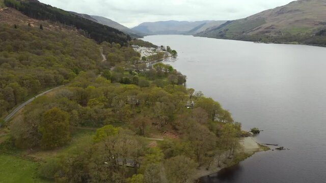Aerial view of Loch Earn in Perth and Kinross, Scotland. Flying left to right over the loch looking away from St Finnans.