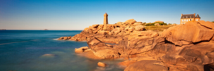 Lighthouse of Ploumanach at the golden hour in Perros-Guirec, Côtes d'Armor, Brittany, France