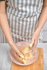 housewife cooking on kitchen at the home.