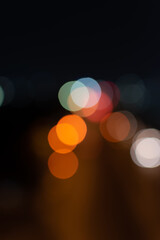 Abstract bokeh nightlight and blur car light bokeh on street background.