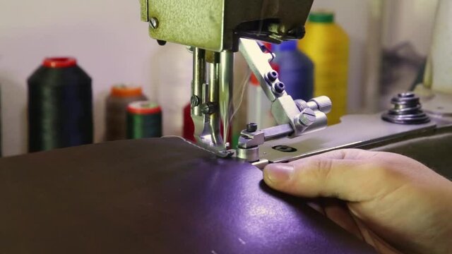 The sound of a machine sewing a leather