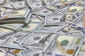100 USD banknotes lots of background texture close up money
