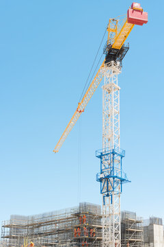 Construction site with a big tower crane.