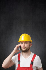 A construction worker using smartphone