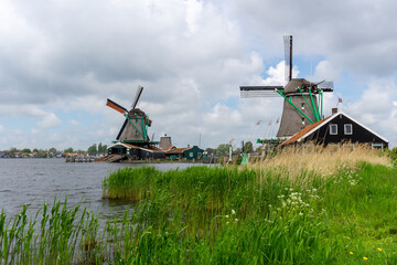 Naklejka premium view of the historic windmills at Zaanse Schaans in North Holland
