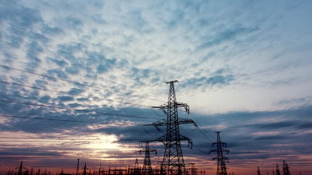 High voltage post.High voltage tower sky background. High-voltage power lines. Electricity distribution station. high voltage electric transmission tower. Distribution electric substation with power