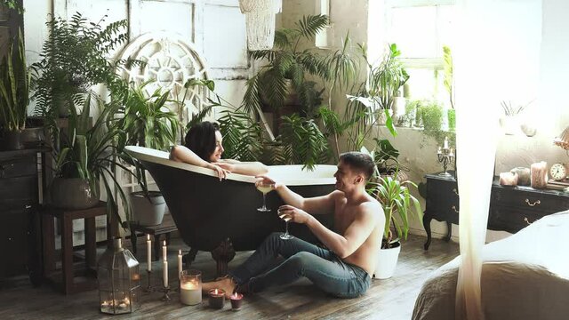 Young couple taking an hot bath in a tropical destination