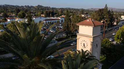 Sunset aerial view of the public clock tower of downtown La Habra, California, USA. - obrazy, fototapety, plakaty