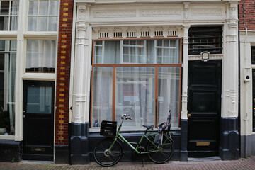 Fototapeta na wymiar The crooked house in the city of Amsterdam