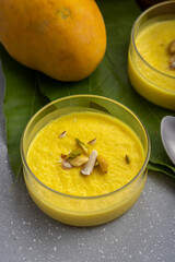 mango-flavored Phirni served in  glass bowls