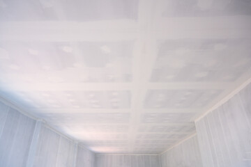 White ceilings and empty rooms or buildings Construction and gypsum ceiling paint putty inside the...