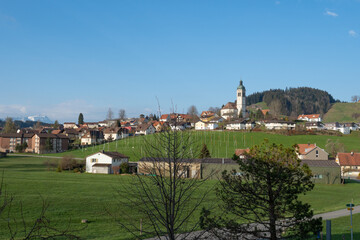 Fototapeta na wymiar View of the village of Speicher, Switzerland, with surrounding fields and hills
