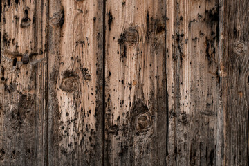 Obraz premium Close-up on dirty old wood planks of fence with chipped.