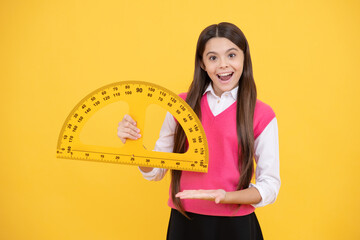 try this. child with protractor. angle degree measurement surprised teen girl hold ruler.
