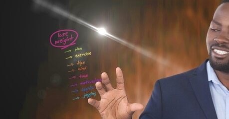 Composition of smiling man using virtual interface with lose weight health list menu