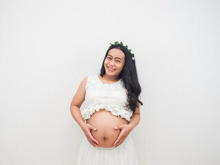 Pregnant woman touch her big belly cheerful smile face on white background