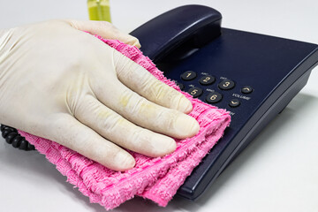 Concept Prevention cleaning frequently, Focus on the high traffic areas that enable pathogens to spread around the telephone equipment such Phone button