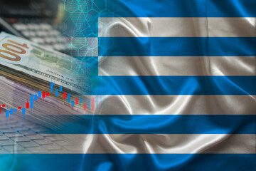 Greece national flag on satin, dollar bills, computer, concept of global trading on the stock exchange, falling and rising prices for world currency