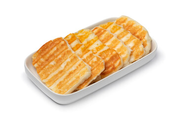 Mediterranean tasty grilled halloumi cheese close up isolated on white background 