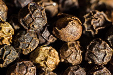 closeup of black and red peppercorns. macro photography. Spices for cooking food.