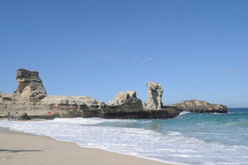 Beautiful scenery of extreme waves with blue skies on Klayar Beach, Pacitan Indonesia