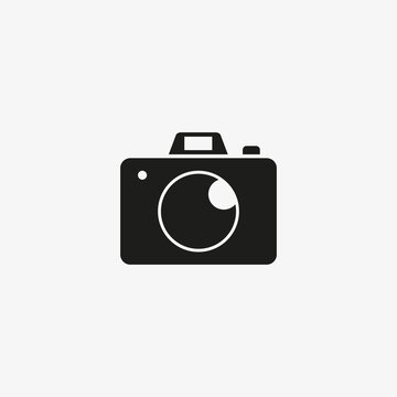 Photo camera flat of black color. photography icon on white background