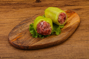 Raw stuffed pepper for cooking