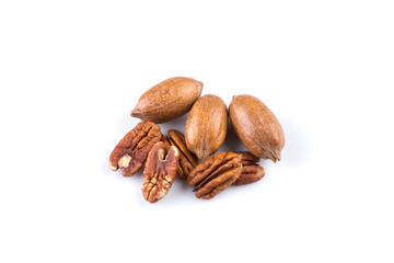 Few pecan nuts isolated on white