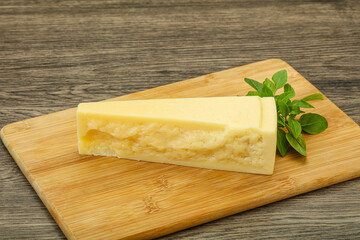 Hard parmesan cheese served basil
