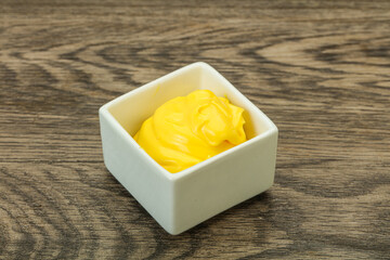 Natural cheese sauce in the bowl