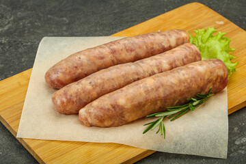 Raw pork meat sausages for grill