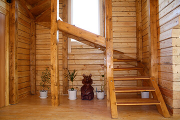 Wooden staircase in a wooden house.