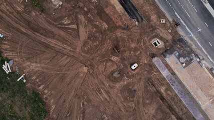 Modern urban development. Construction site with multi-storey buildings under construction. Construction work is underway. Aerial photography.