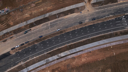 Modern urban development. Construction site with multi-storey buildings under construction. Construction work is underway. Aerial photography.
