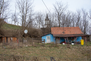 Obraz premium Small blue house in Milas, Bistrita, Romania, 2021