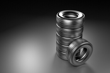 New winter tires with a modern tread on the black background