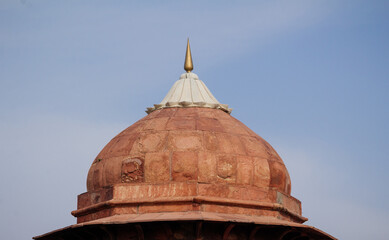 India travel tourism background - Red Fort (Lal Qila) Delhi - World Heritage Site. Inside view of the Red Fort, ancient tower of red stone in the fortress the dom