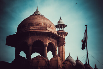 India travel tourism background - Red Fort (Lal Qila) Delhi - World Heritage Site. Inside view of the Red Fort, ancient tower of red stone in the fortress the dom