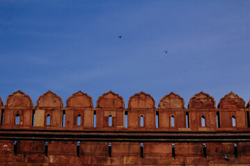 Wall of Red Fort (Lal Qila) Delhi - World Heritage Site. Inside view of the Red Fort, ancient tower of red stone in the fortress the dom