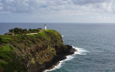 Fototapeta na wymiar Kilauea Lighthouse is located in a protected home for nesting seabirds. A very popular landmark attraction in Kauai. 
