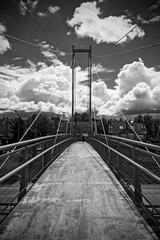 Obraz premium An urban bridge and sky with clouds