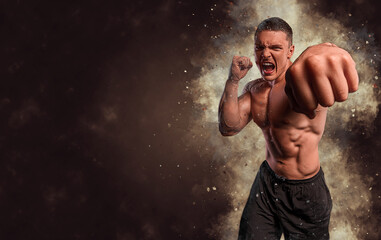 Energy and power boxing concept. Sports advertising. fighting muscular man in smoke on dark...