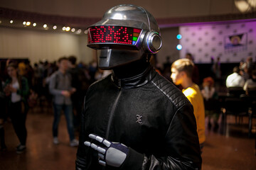 Fototapeta premium Kiev, Ukraine - May 20, 2018: Comic Con, an annual festival of geek culture in Kiev, Ukraine. Cosplayers in costumes. People in costumes of characters in the Daft Punk, Marvel, DC Universe